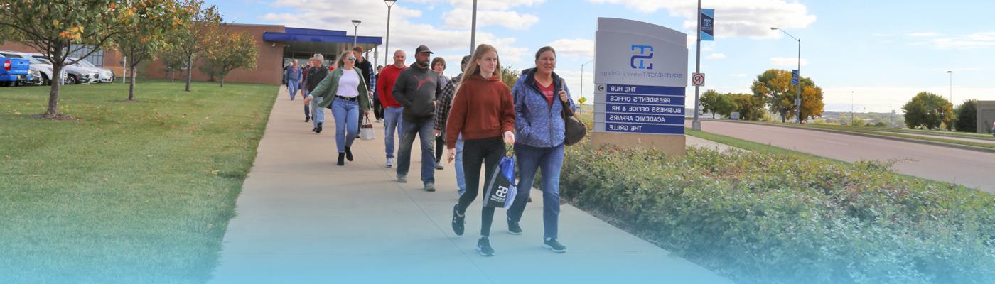 Group of students on campus tour outside the HUB